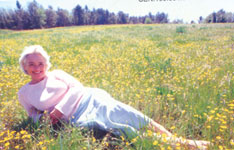 Woman lying in Meadow
